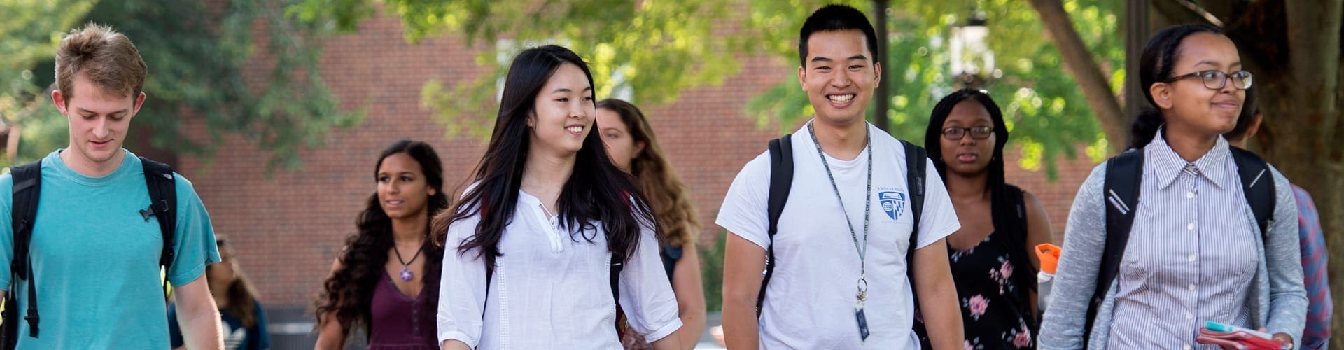 several students walking across campus